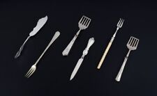 A collection of older silver cutlery.  Late 19th C. picture